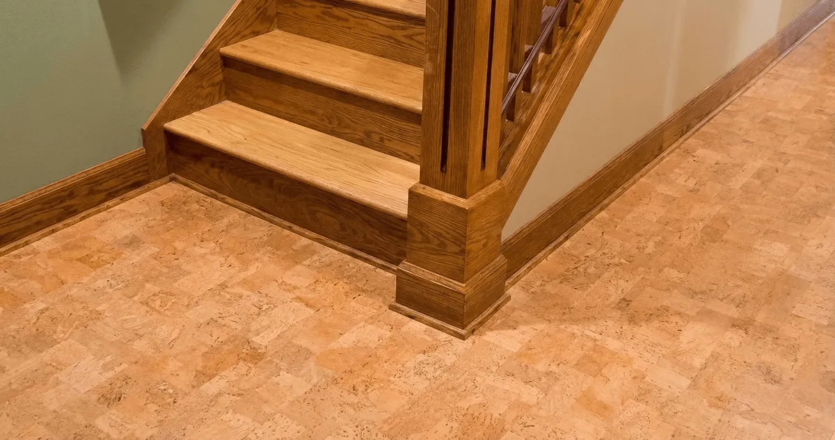 End of a staircase with cork flooring in Charlotte, NC